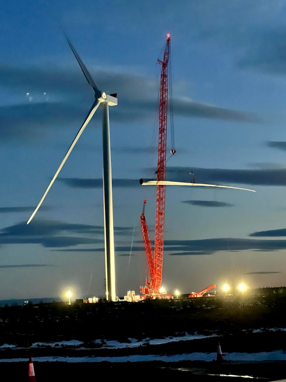 Installing a wind turbine blade at Strathrory wind farm.